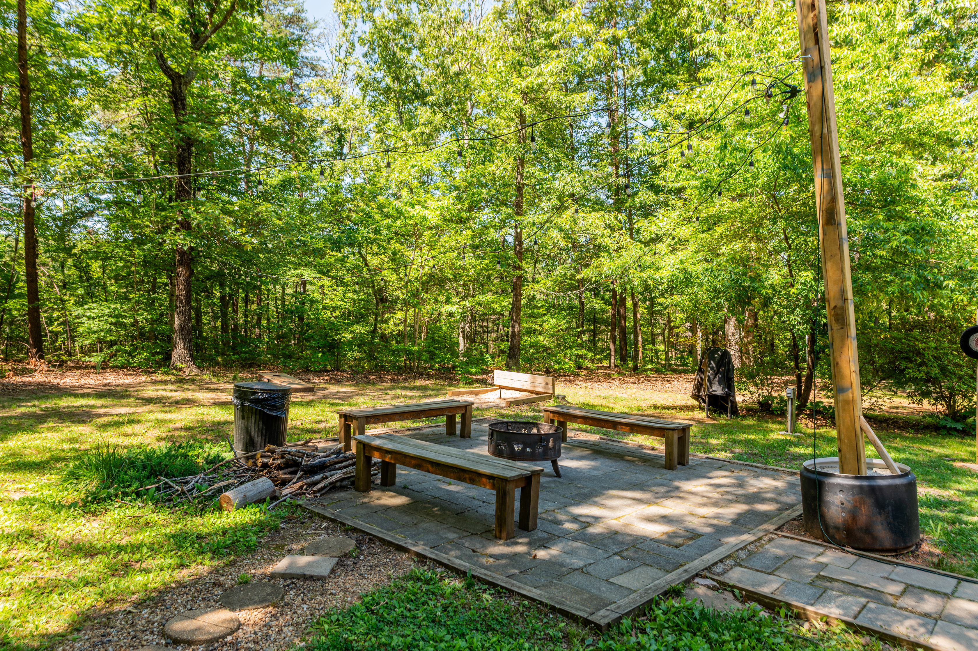 Outdoor Retreat: Gather around the fire pit and soak in nature's beauty at this serene hideaway!