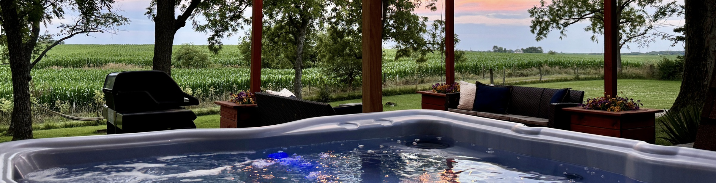 Soak up the sunset in the beautiful Hidden Grove hot tub