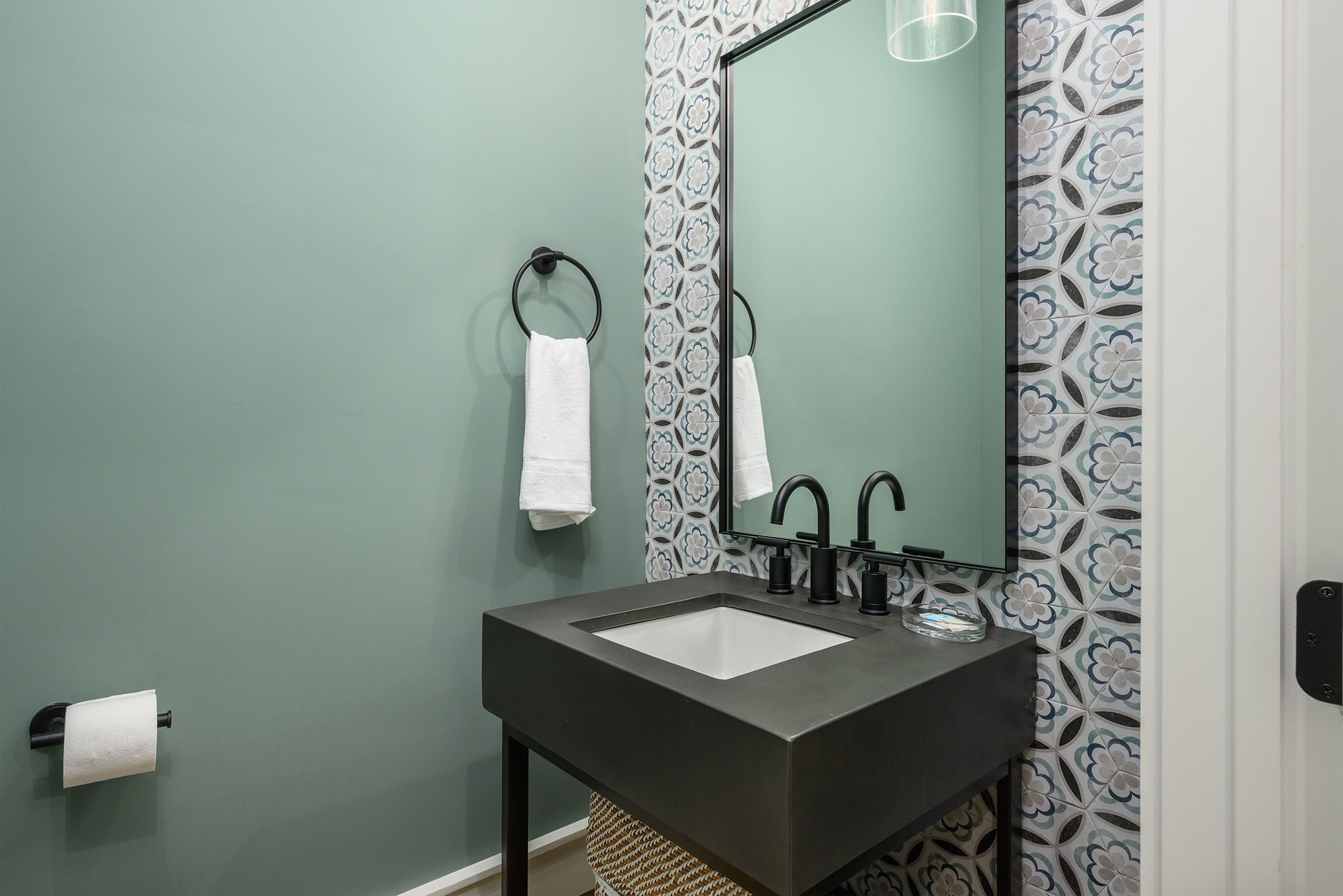 Powder room off the kitchen and laundry room