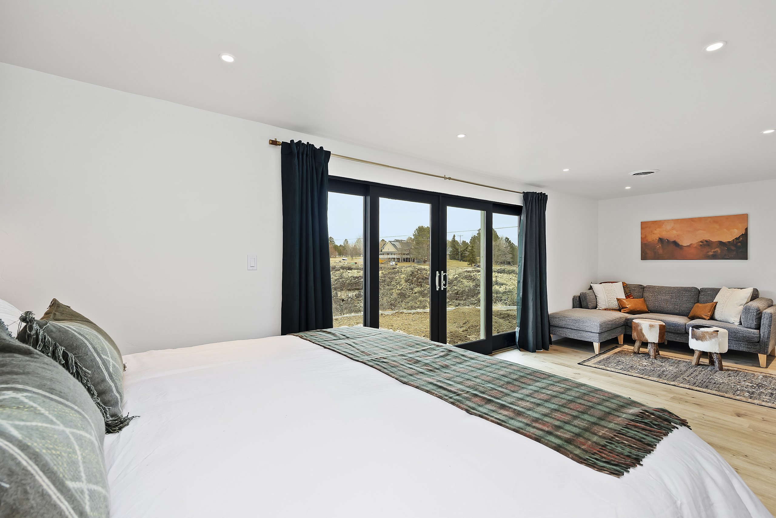 Canyon views from bed, with the master's own sitting area alongside
