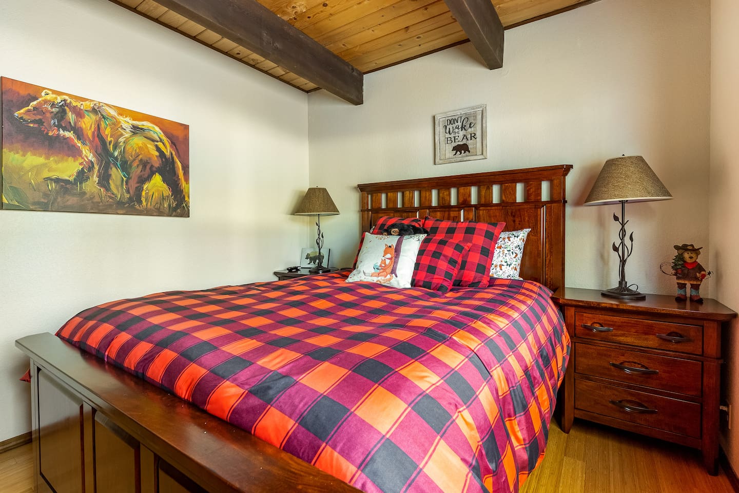 The "Bear Cave" - the second bedroom (main floor) features a queen-sized bed and overlooks the peaceful backyard.  This room also has a TV with Chromcast.