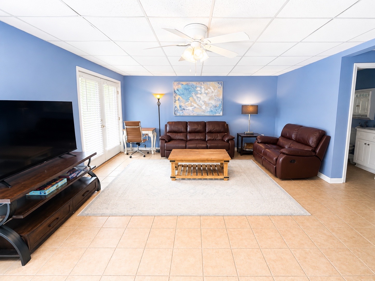 Spacious lower-level lounge with comfortable seating