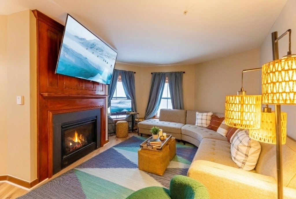 This living room features a comfortable seating area and a smart TV.