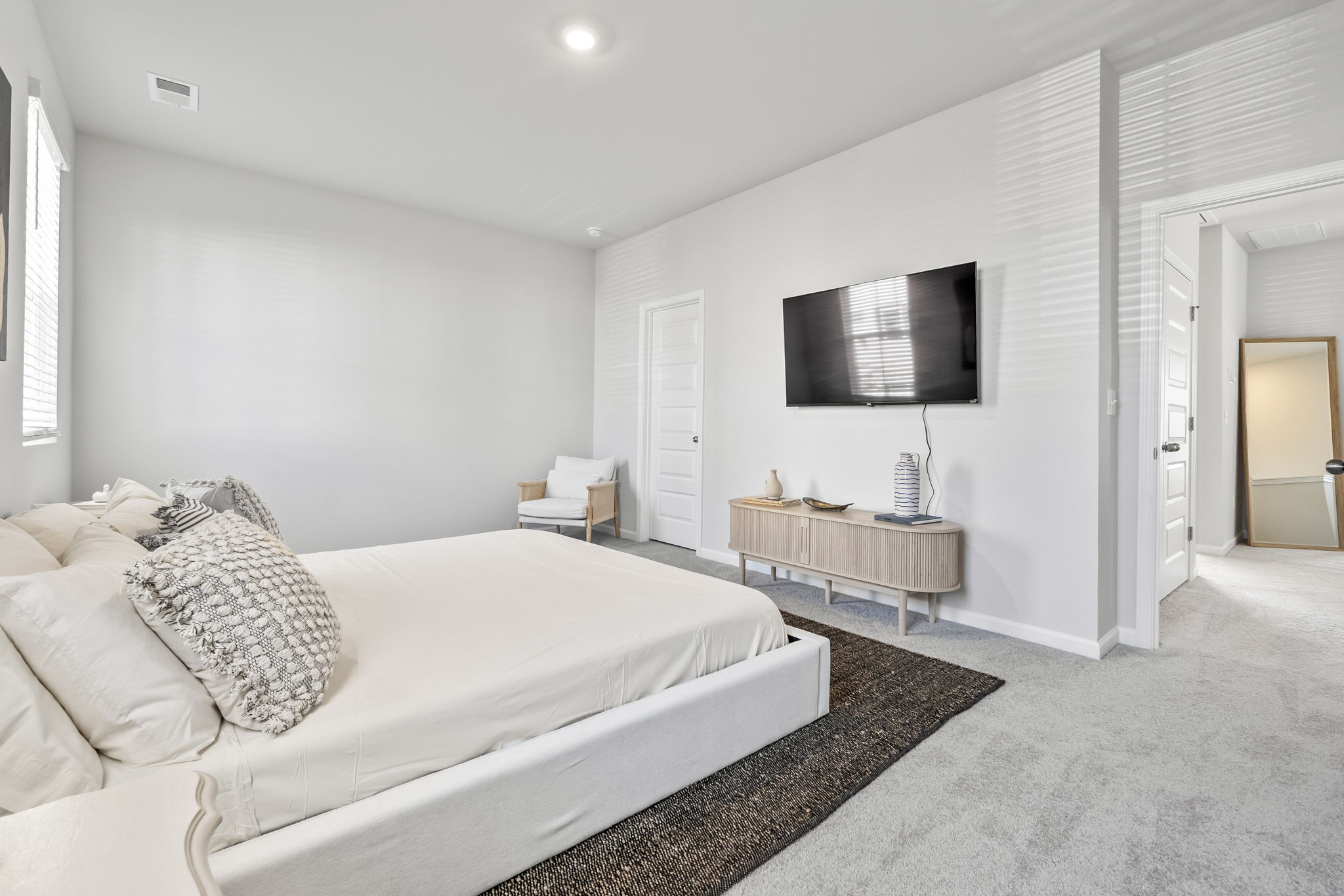 Master Bedroom with King Bed, walk in closet, ensuite bathroom and Roku Smart TV
