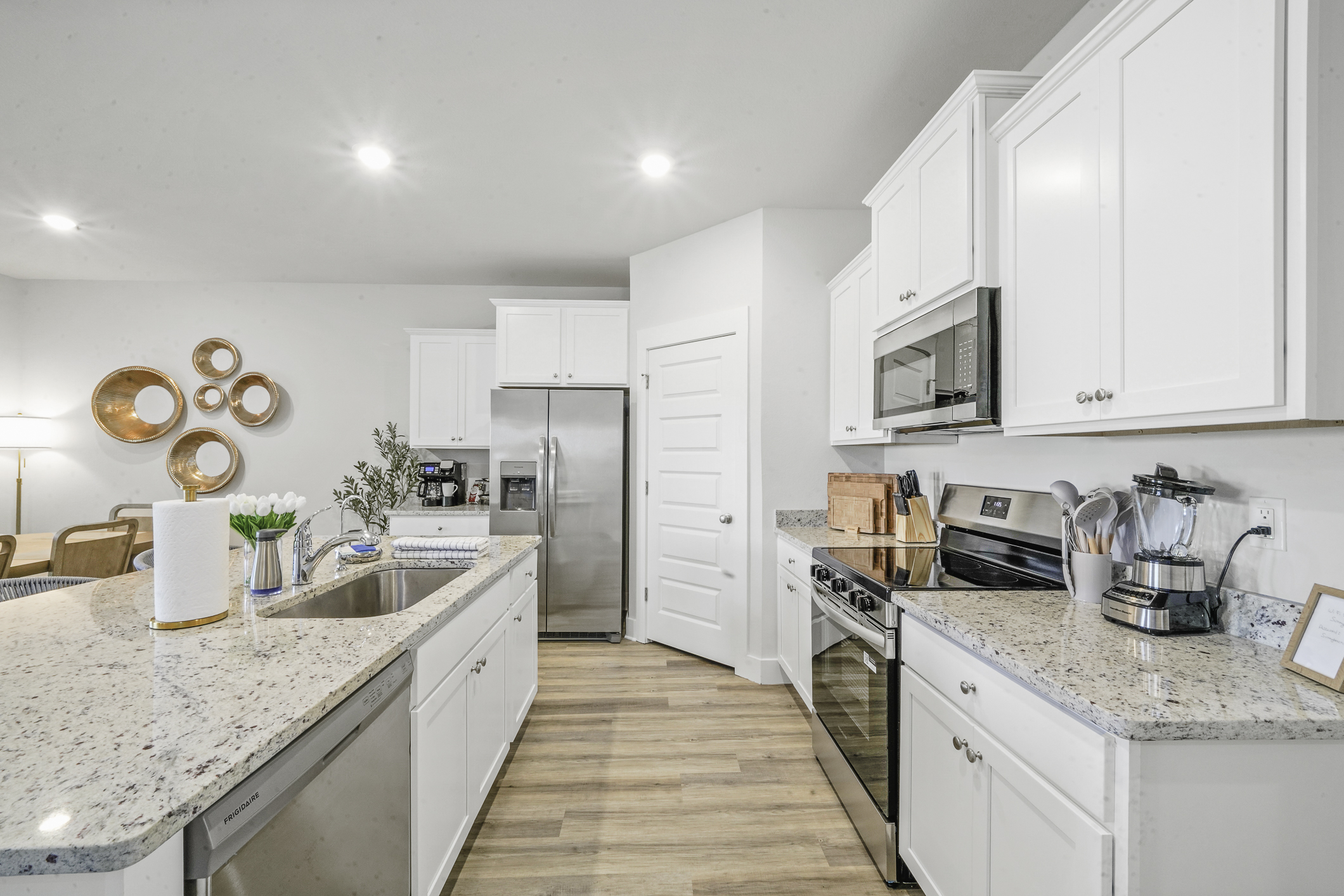 Fully stocked kitchen with modern appliances and plenty of space to cook. Perfect for family meals, gatherings, and morning coffee