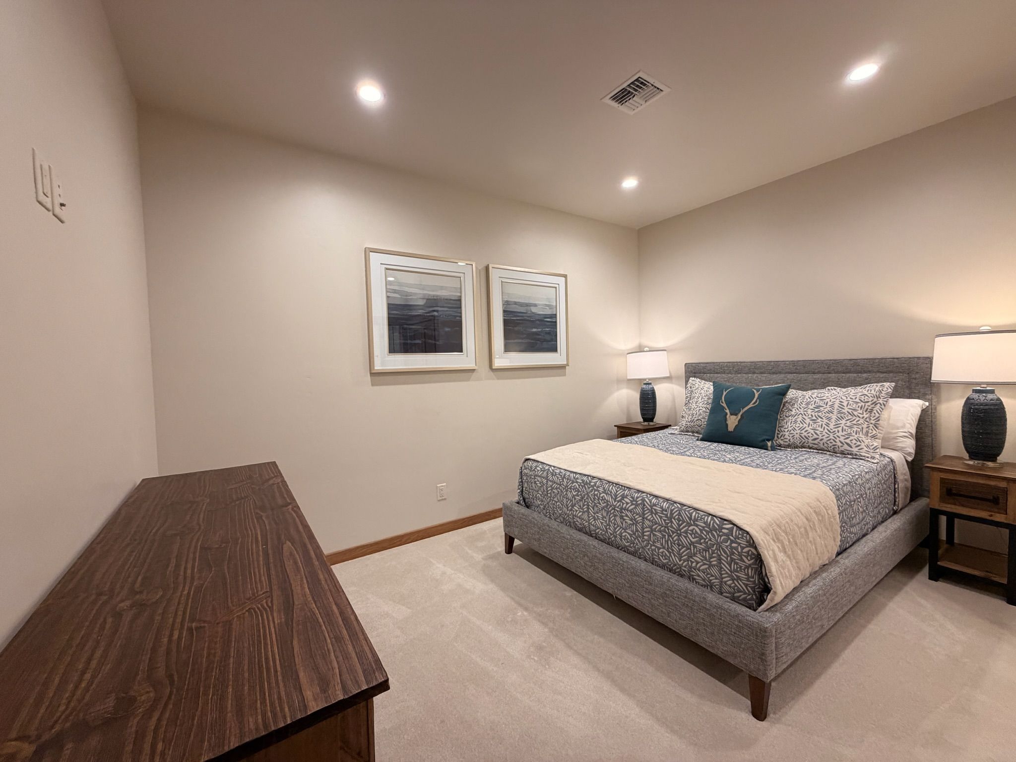 Comfortable luxury meets timeless design in this spacious bedroom retreat.
