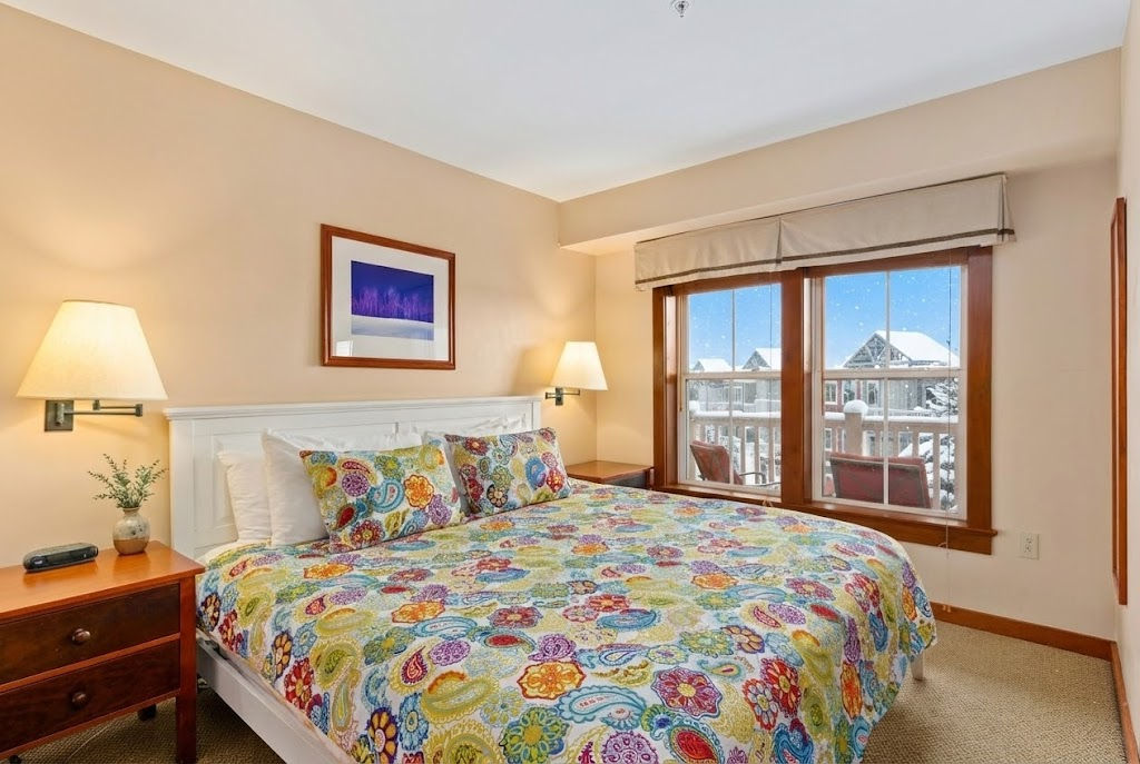 Escape to our luxurious bedroom, featuring a comfortable king bed.