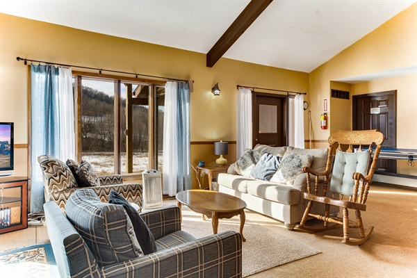 There's a game table tucked in back there! From air hockey to badminton, or convert it to a dining table for groups with accessibility needs.