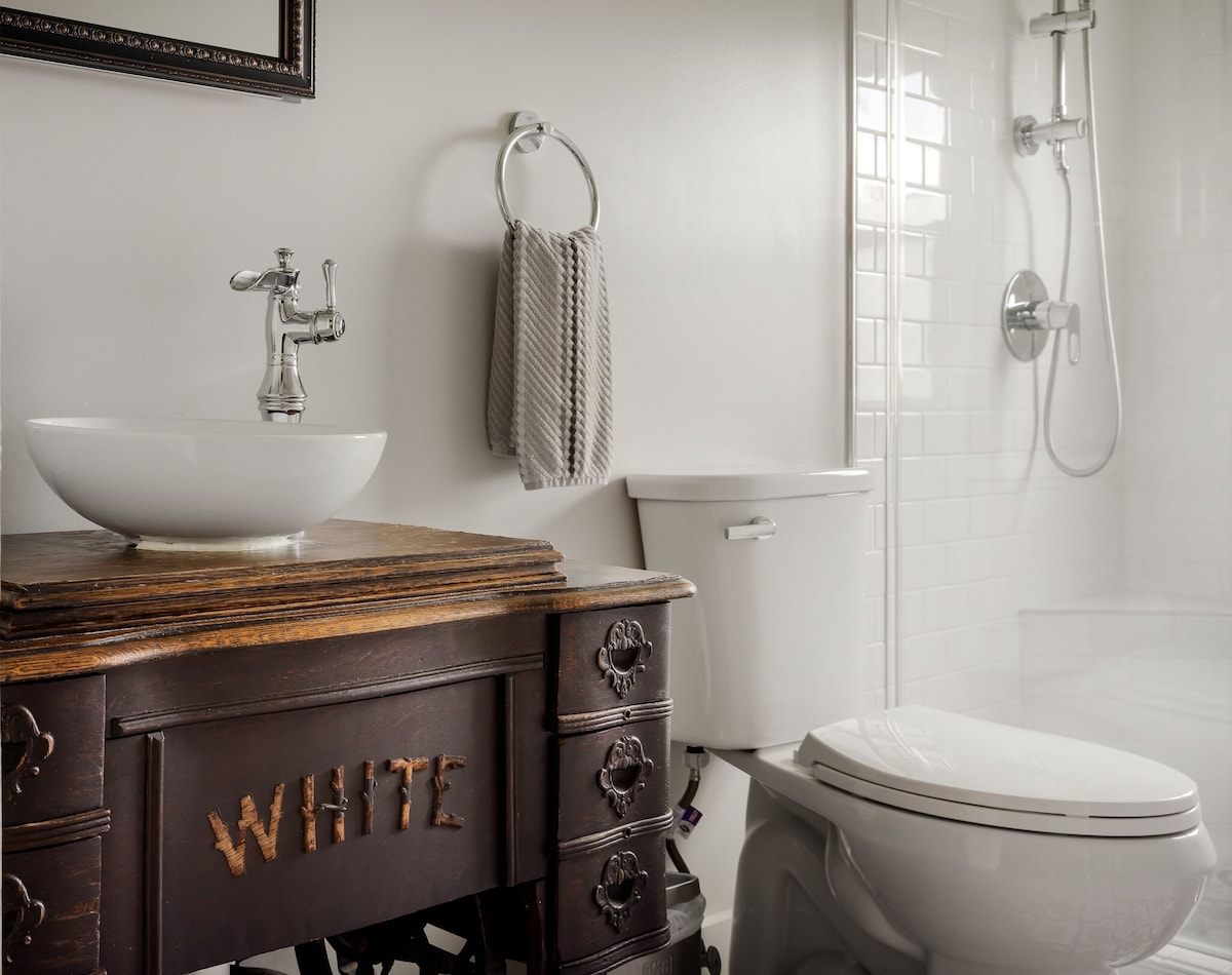 Bathroom 1, antique sewing machine repurposed as vanity