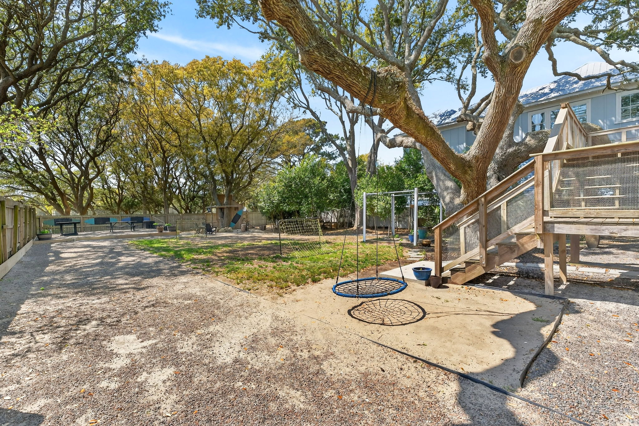 Back of home and tree swing