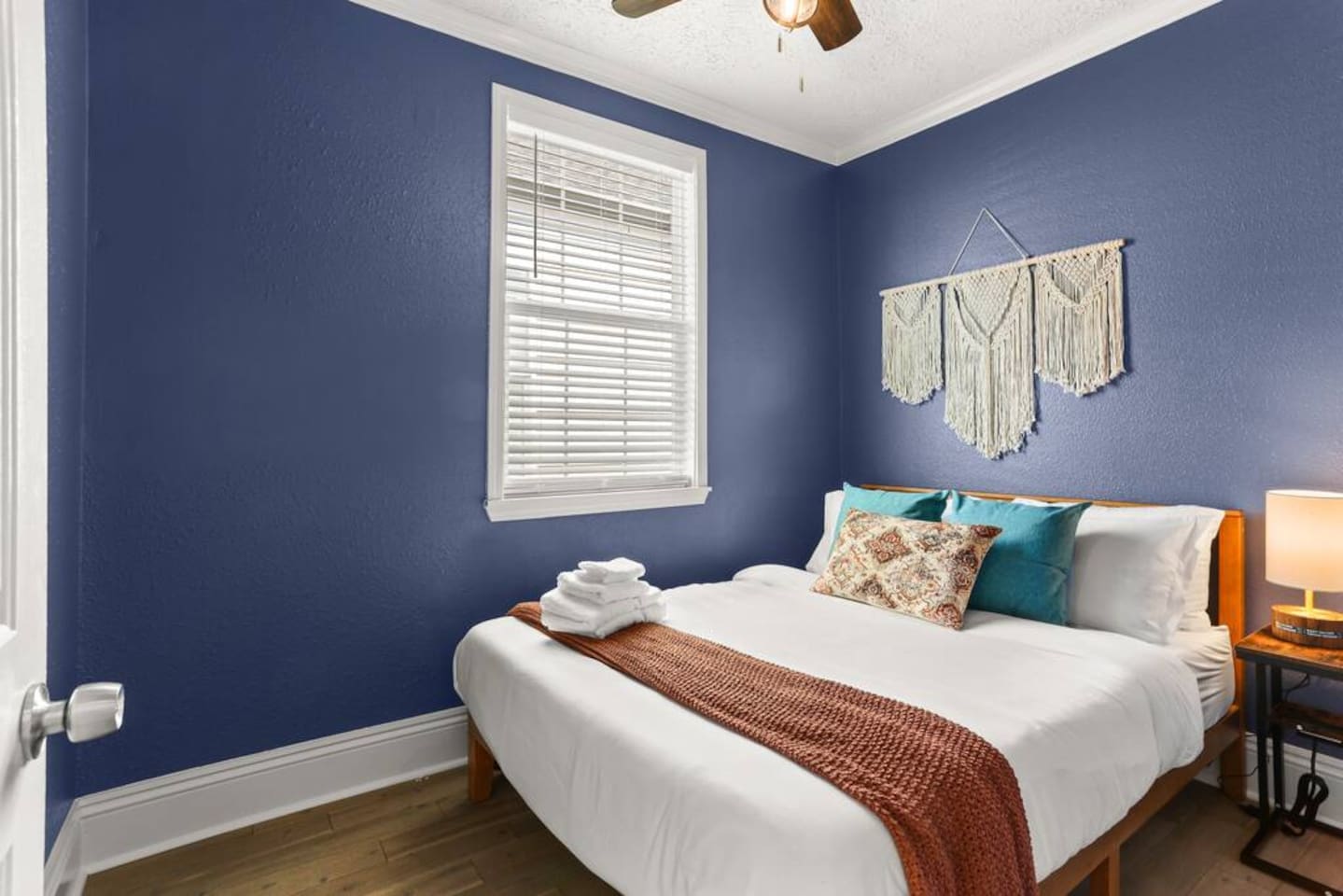 The Blue Room has a queen bed, closet, and ceiling fan for cool, comfy, restful nights.