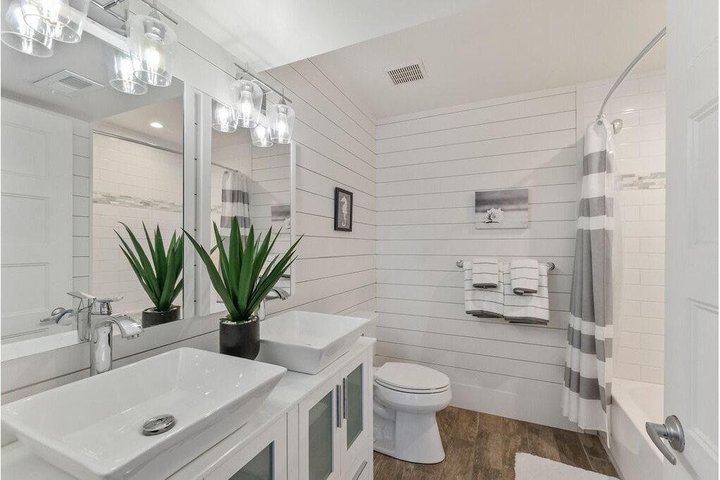 Full bathroom with shower and tub combo