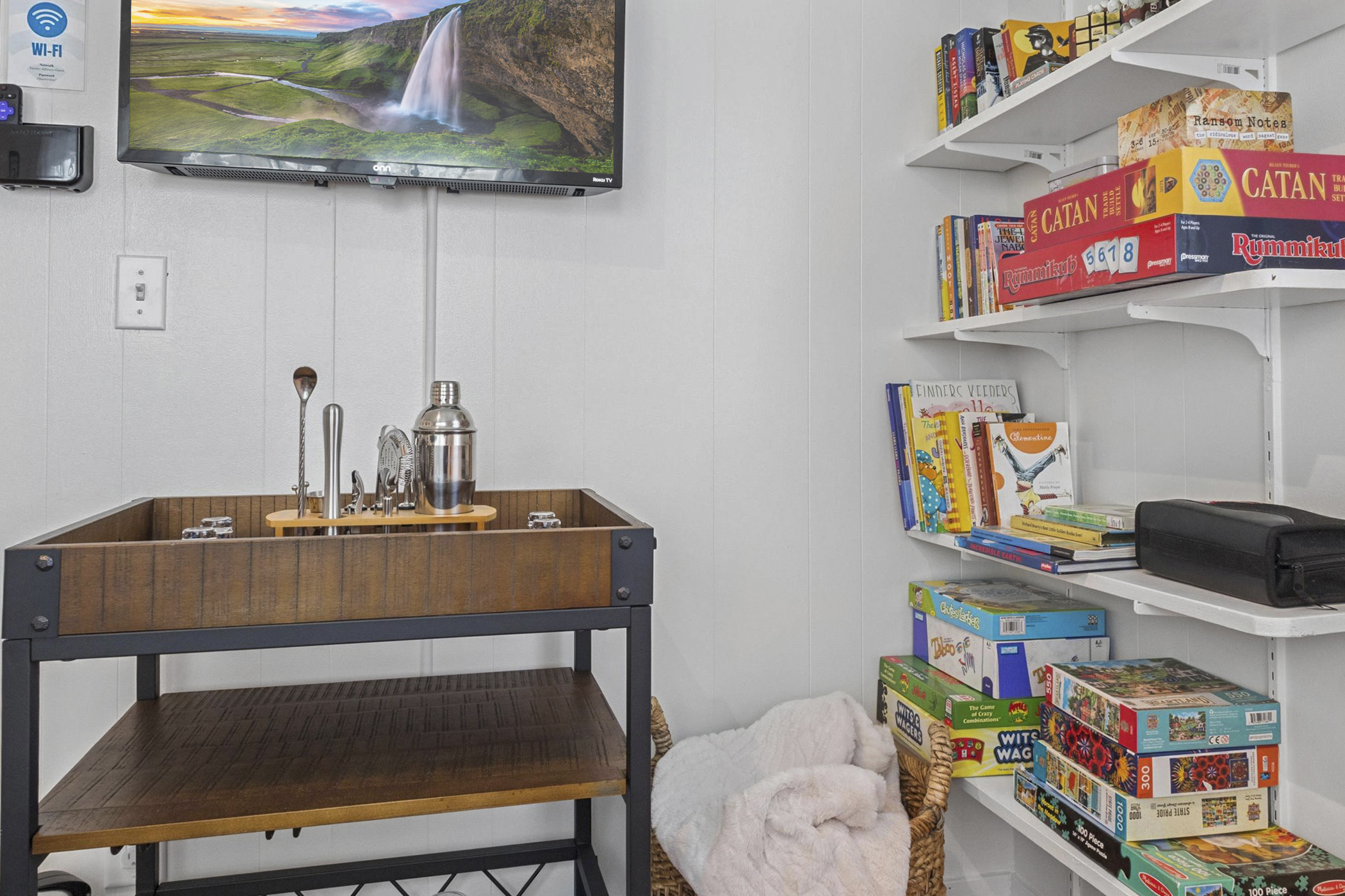 Family favorites, quiet reads, and game night essentials—all in one cozy corner with a smart TV and bar cart. A kid-friendly South Bend stay near Notre Dame, built for connection and fun.