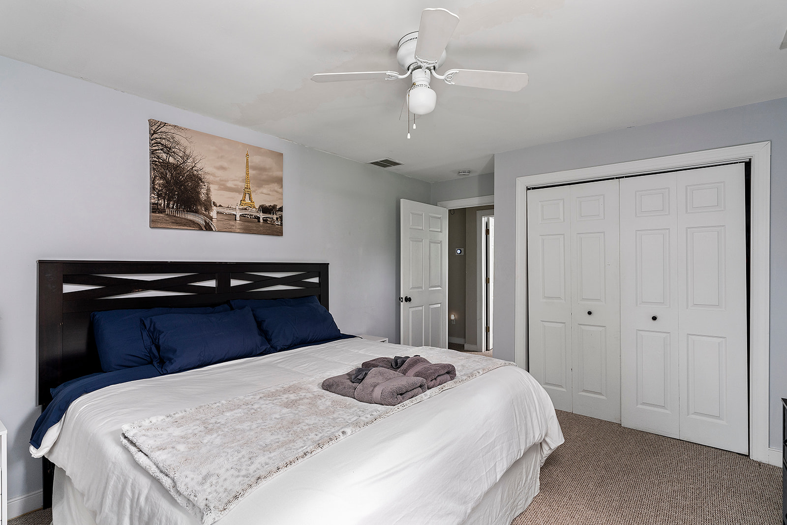 King Bedroom 3: Relax in a spacious king bed with stylish décor and natural light!