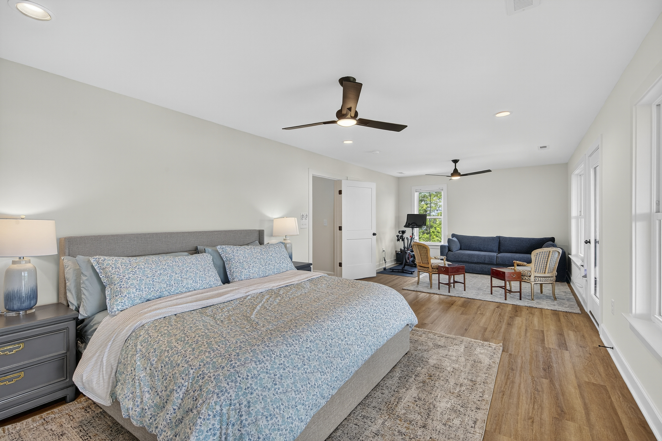 A cozy corner for rest and recharge, complete with a sleeper sofa and peaceful lake views.