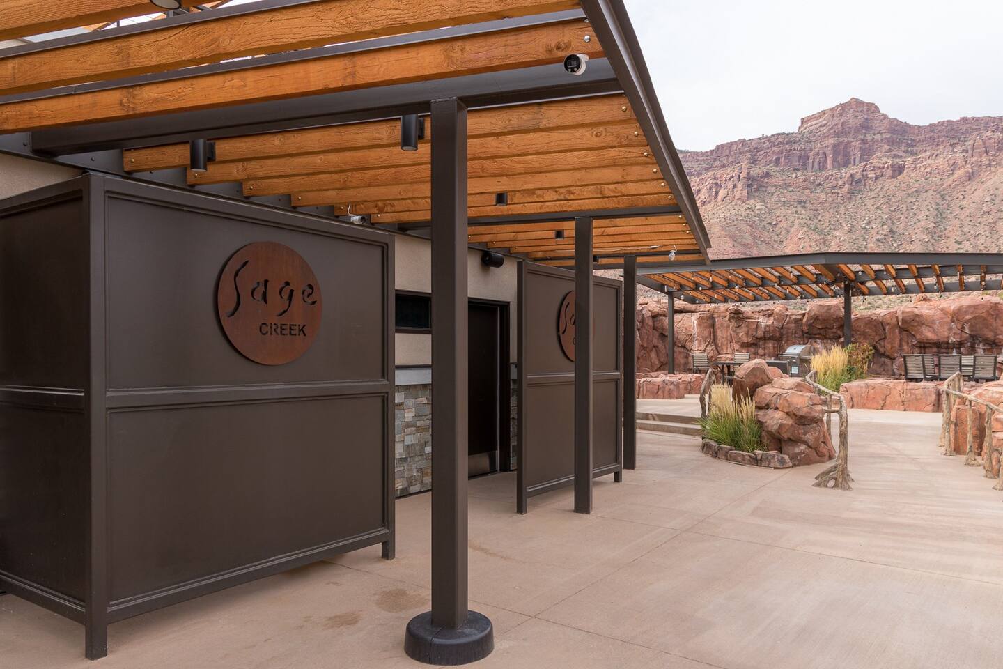 The beautiful outdoor area provides many poolside conveniences.