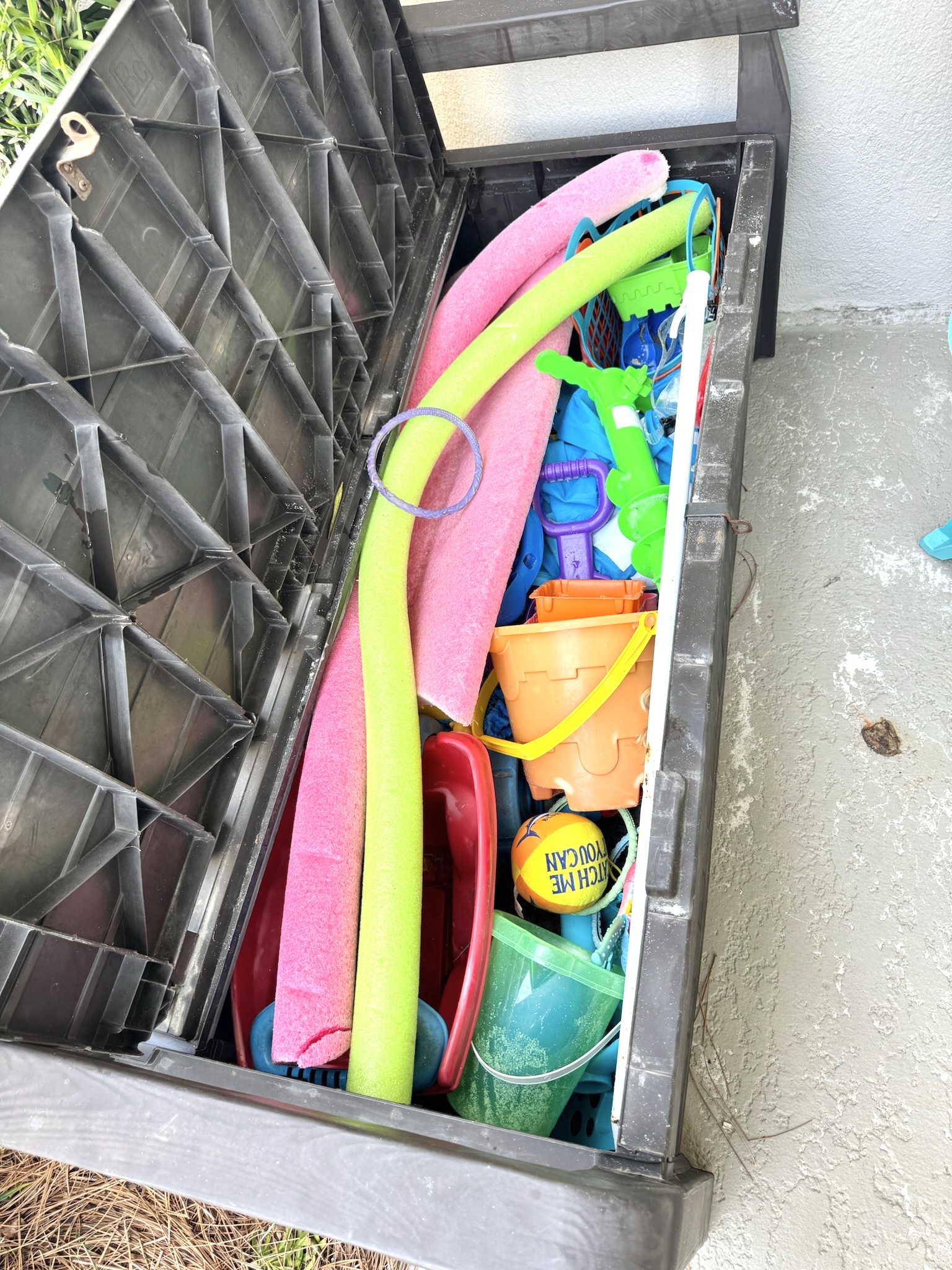 Beach Toys in Patio Bench