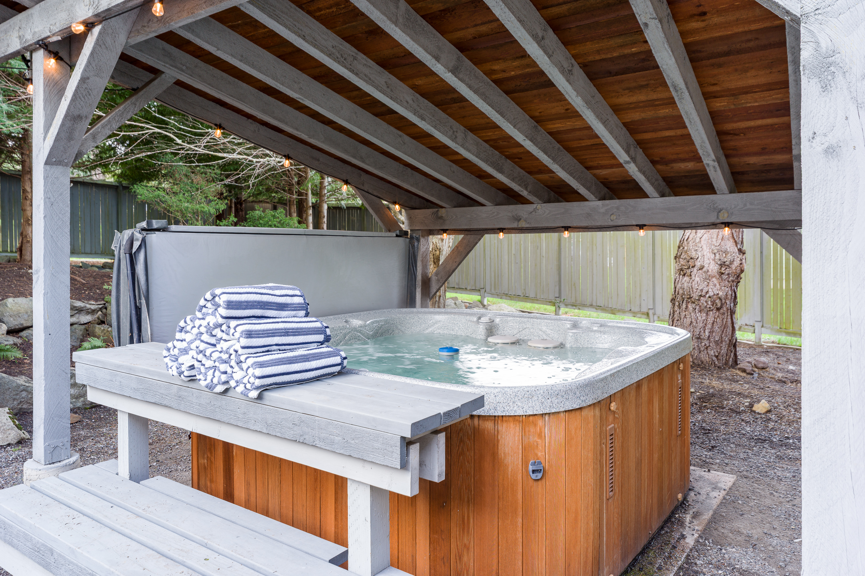 Day or night, this hot tub is perfectly positioned to enjoy a soak that will ease your worries away.