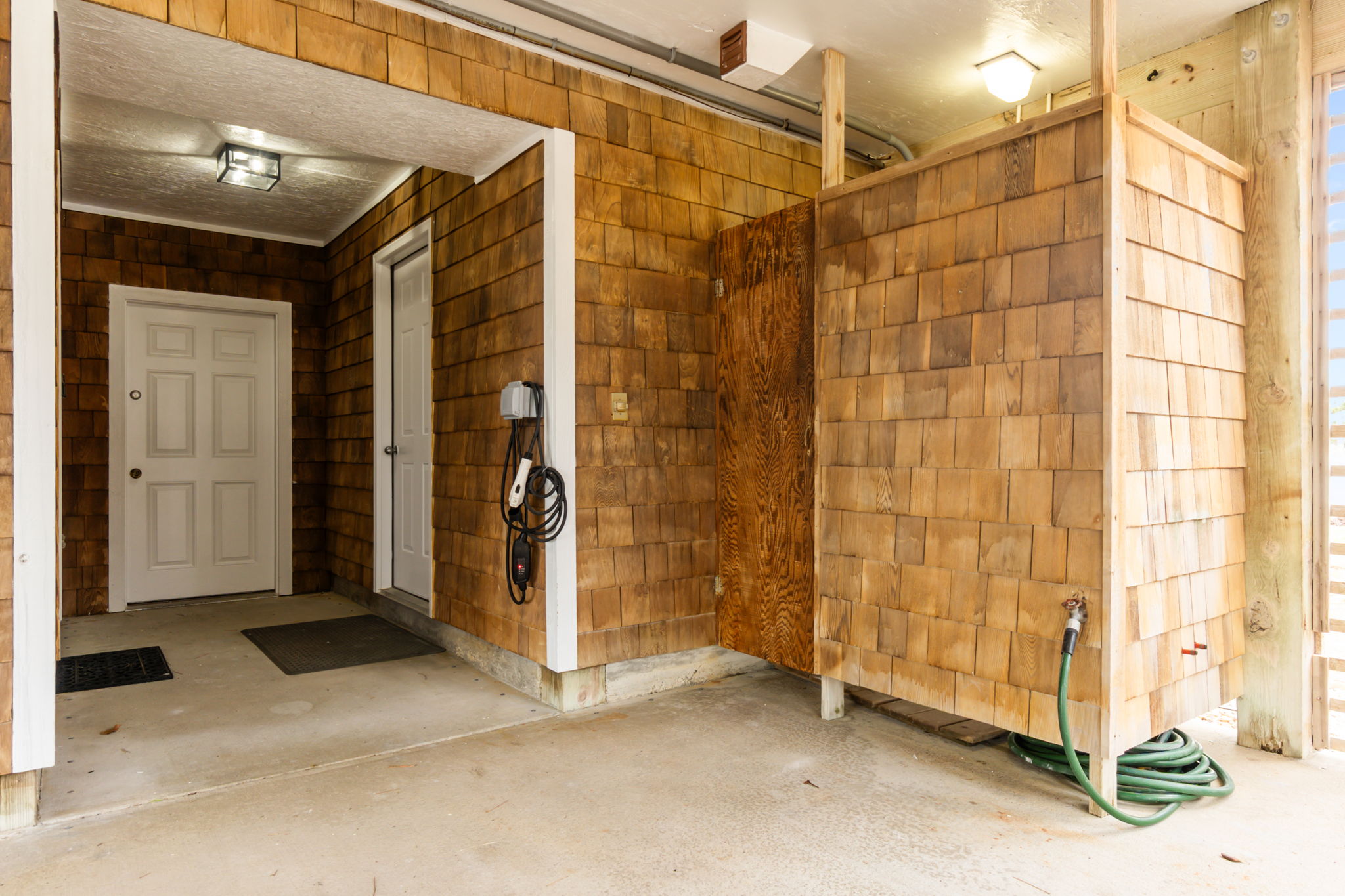 Covered outdoor shower area—great for rinsing off after the beach.