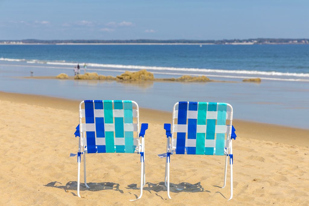 Sun, sand, and seaside seating for ultimate relaxation.