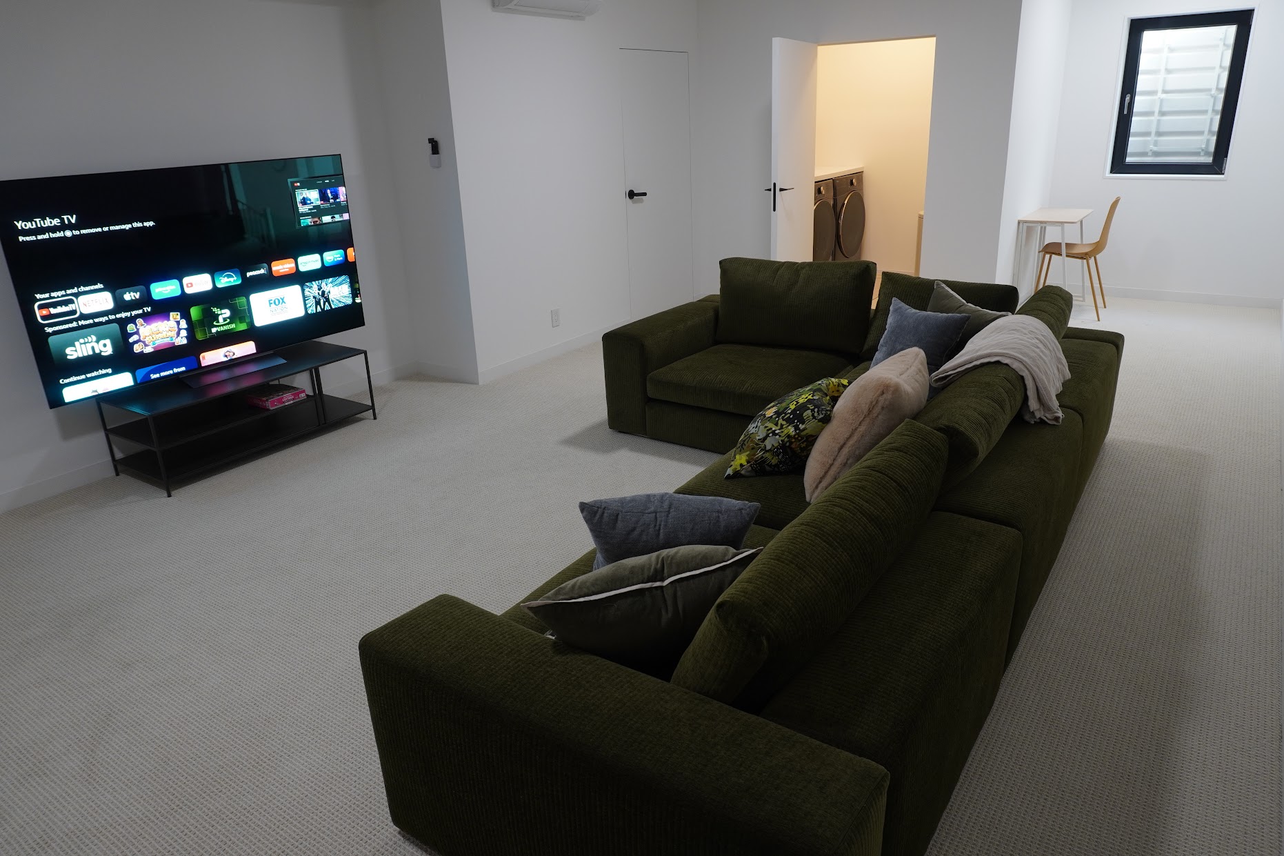 11' foot long couch makes perfect lounging while enjoying the 77" TV.