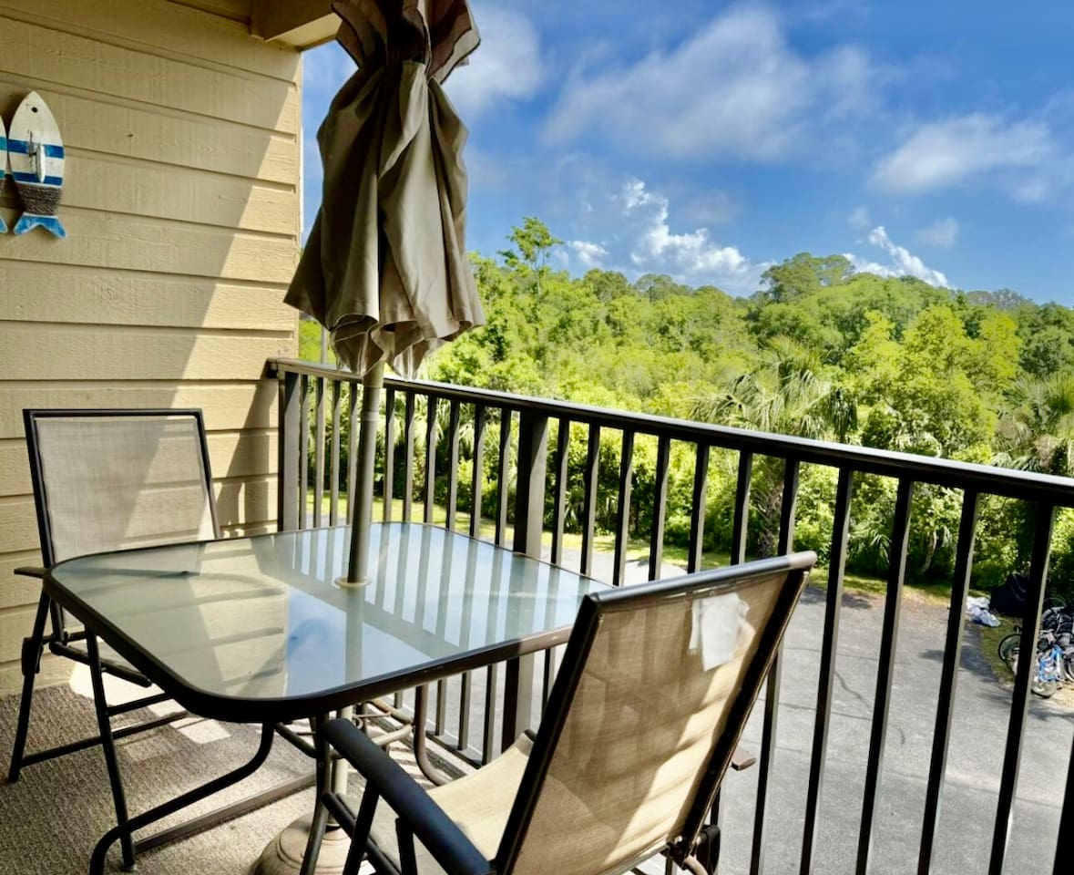 Balcony with table and chairs