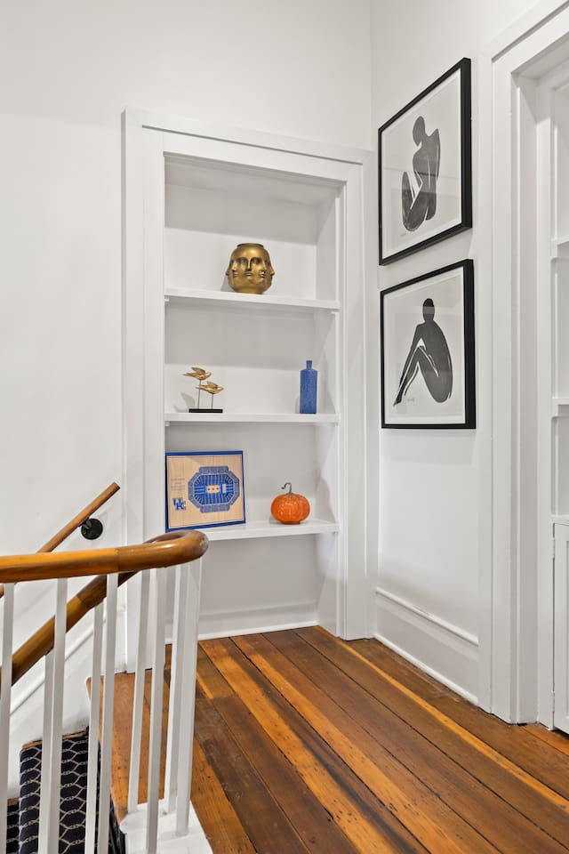 Original handrail and hardwood floors. So much character in this place!