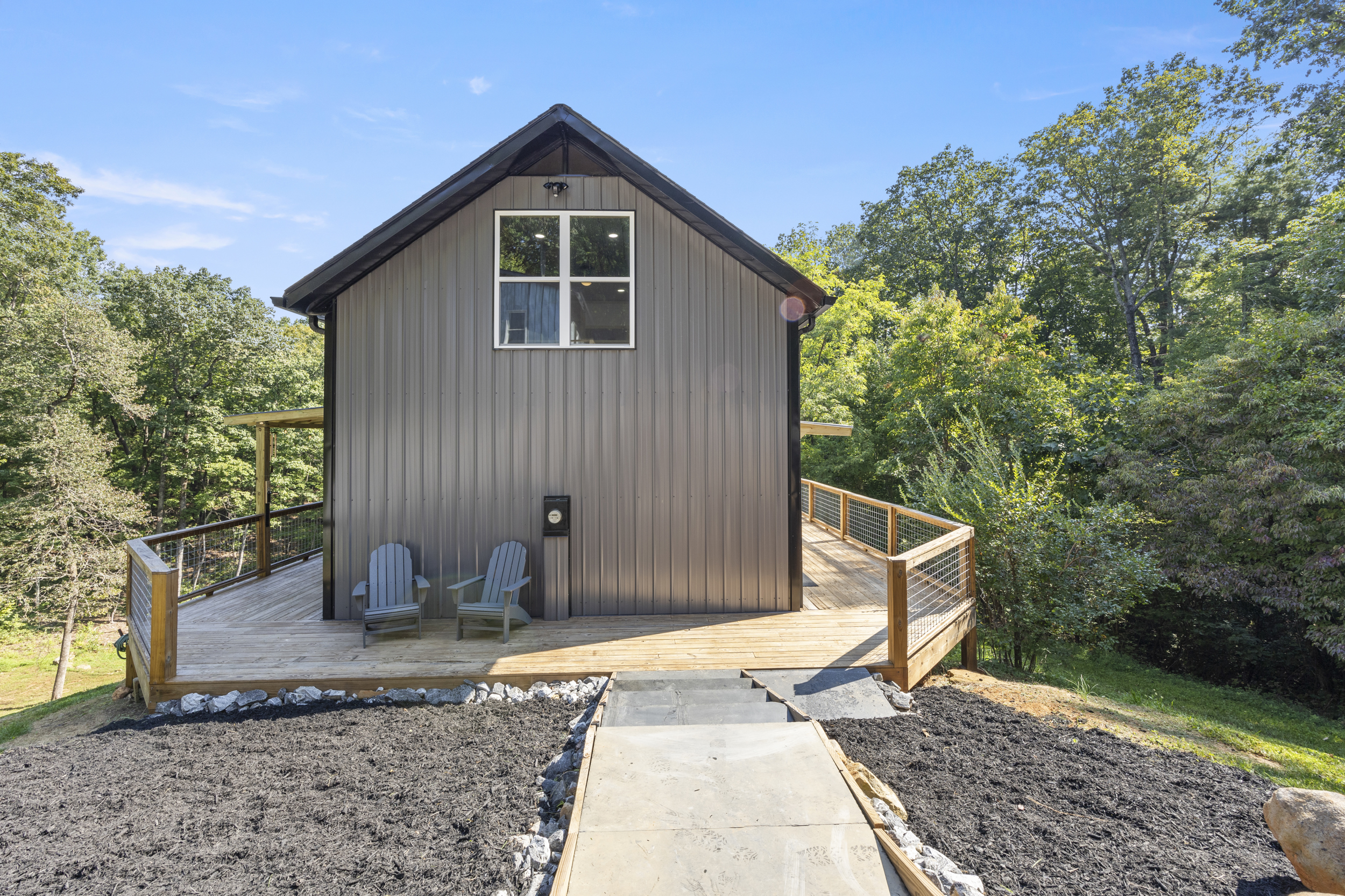 Front view of Heart Ridge, your private retreat set on 8 wooded acres.