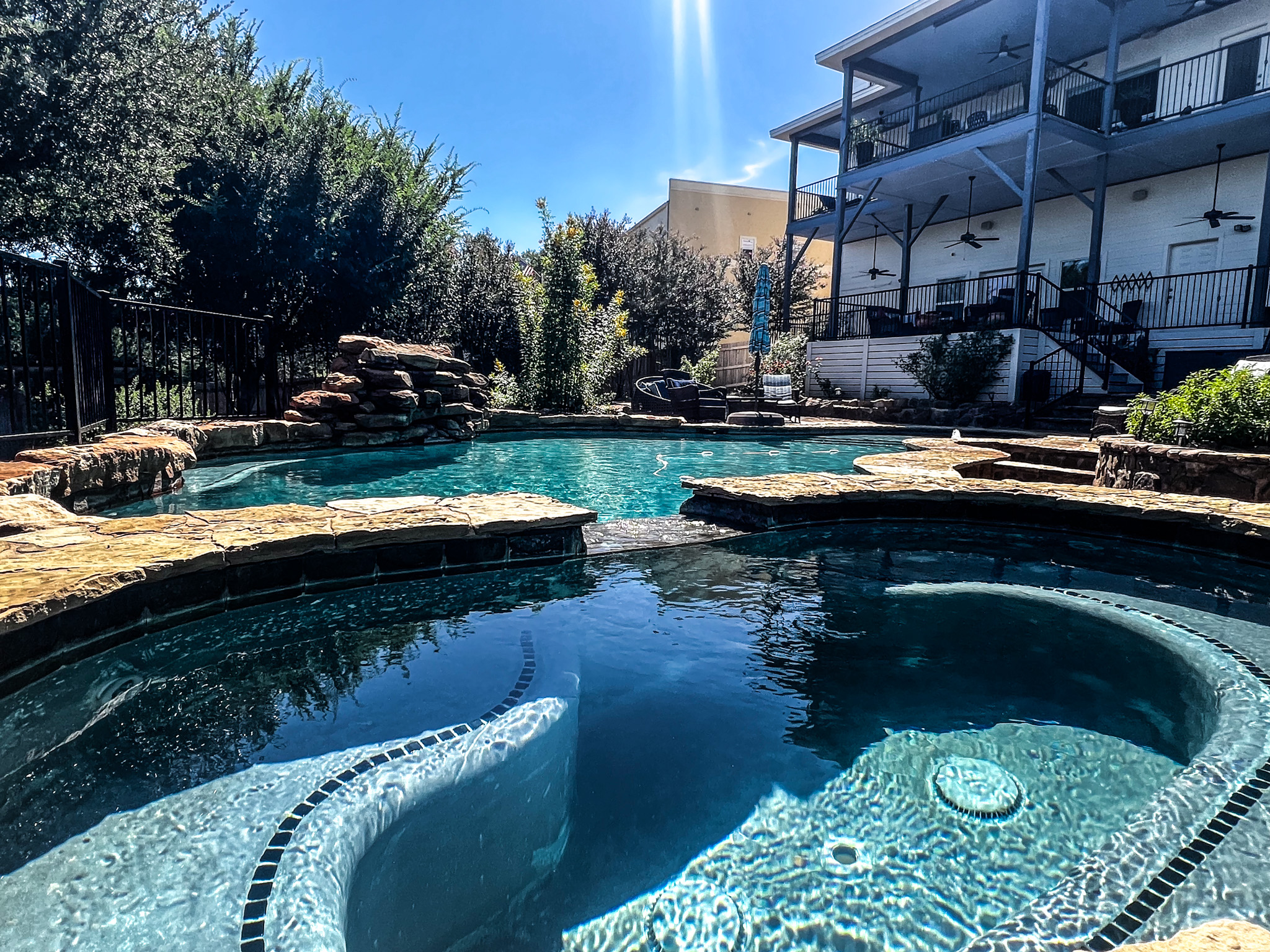 Crystal-clear pool with serene water views, your front-row seat to total relaxation.