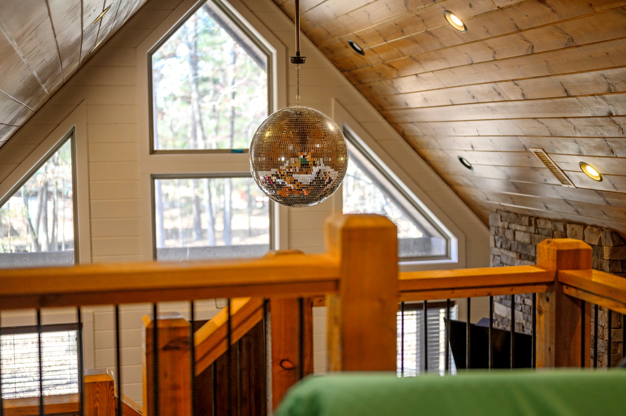 Get up close to the disco ball and enjoy a fun, elevated view of the cabin!