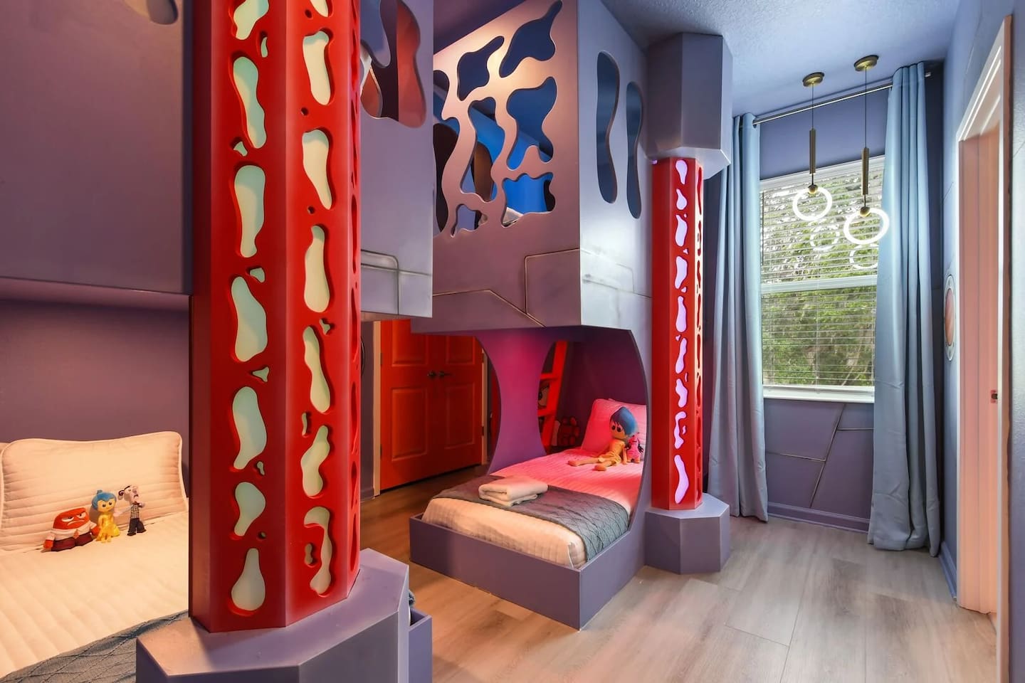 Step into a world of emotions: This Inside Out-themed kids’ room is a vibrant adventure of imagination and joy!