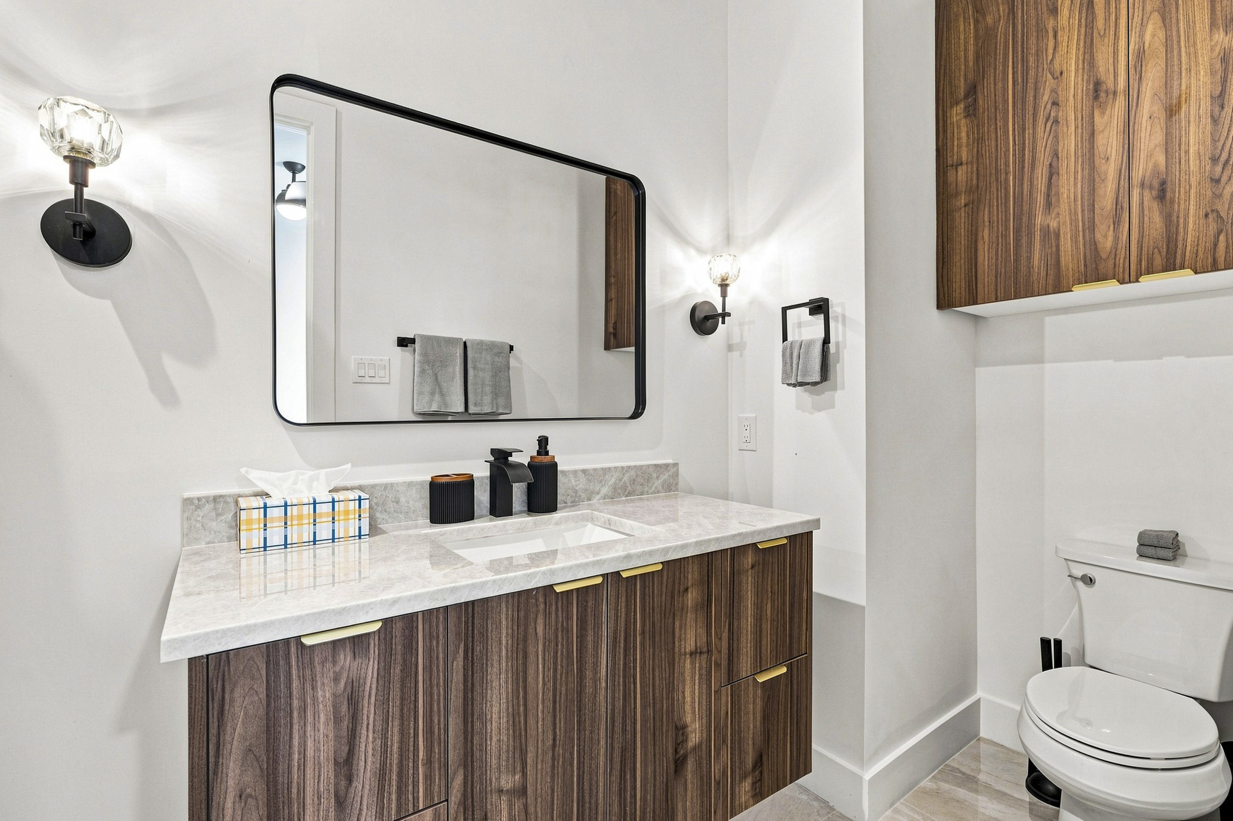 Bright and airy space featuring sleek design and modern fixtures for your refresh!