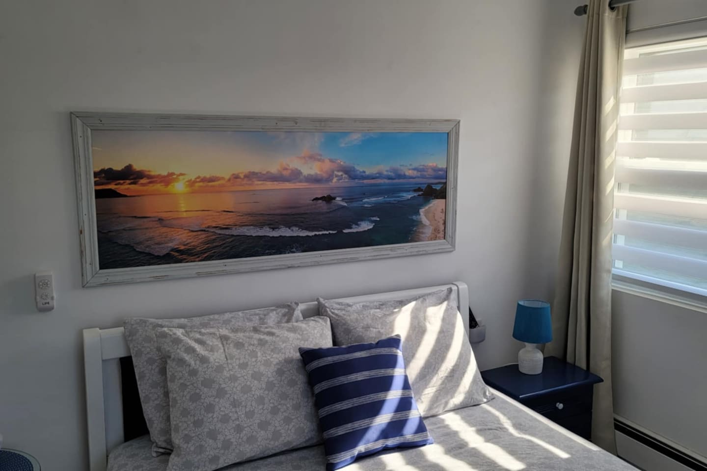 Master bedroom with a plush queen mattress and Air Conditioning