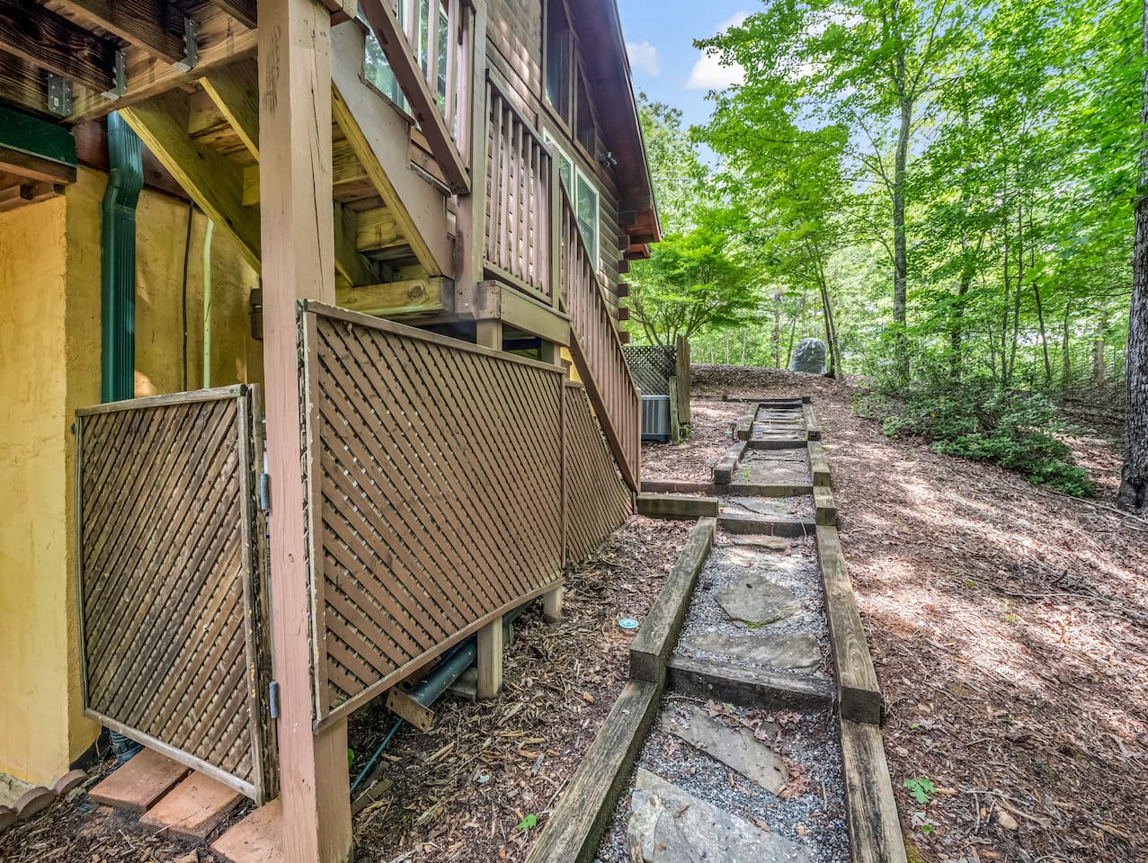 Walkway adjoining front and back of property