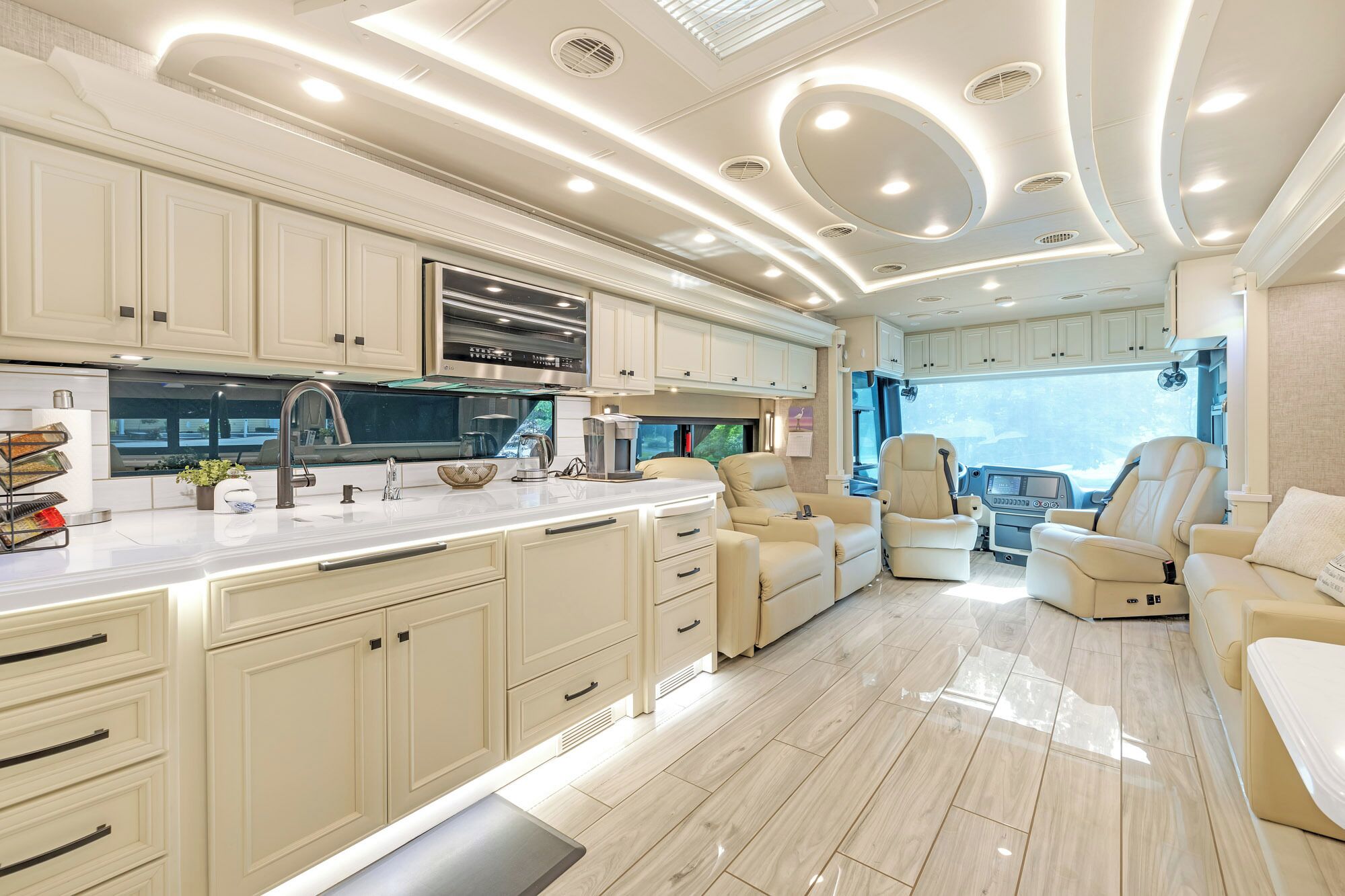 Double sink, convection microwave/oven, induction stove, leather recliners 