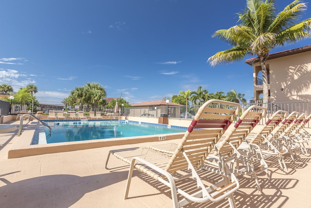 Heated pool is just steps away from the unit.