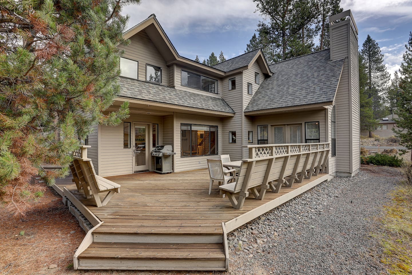 The large, private deck features a gas BBQ for grilling.