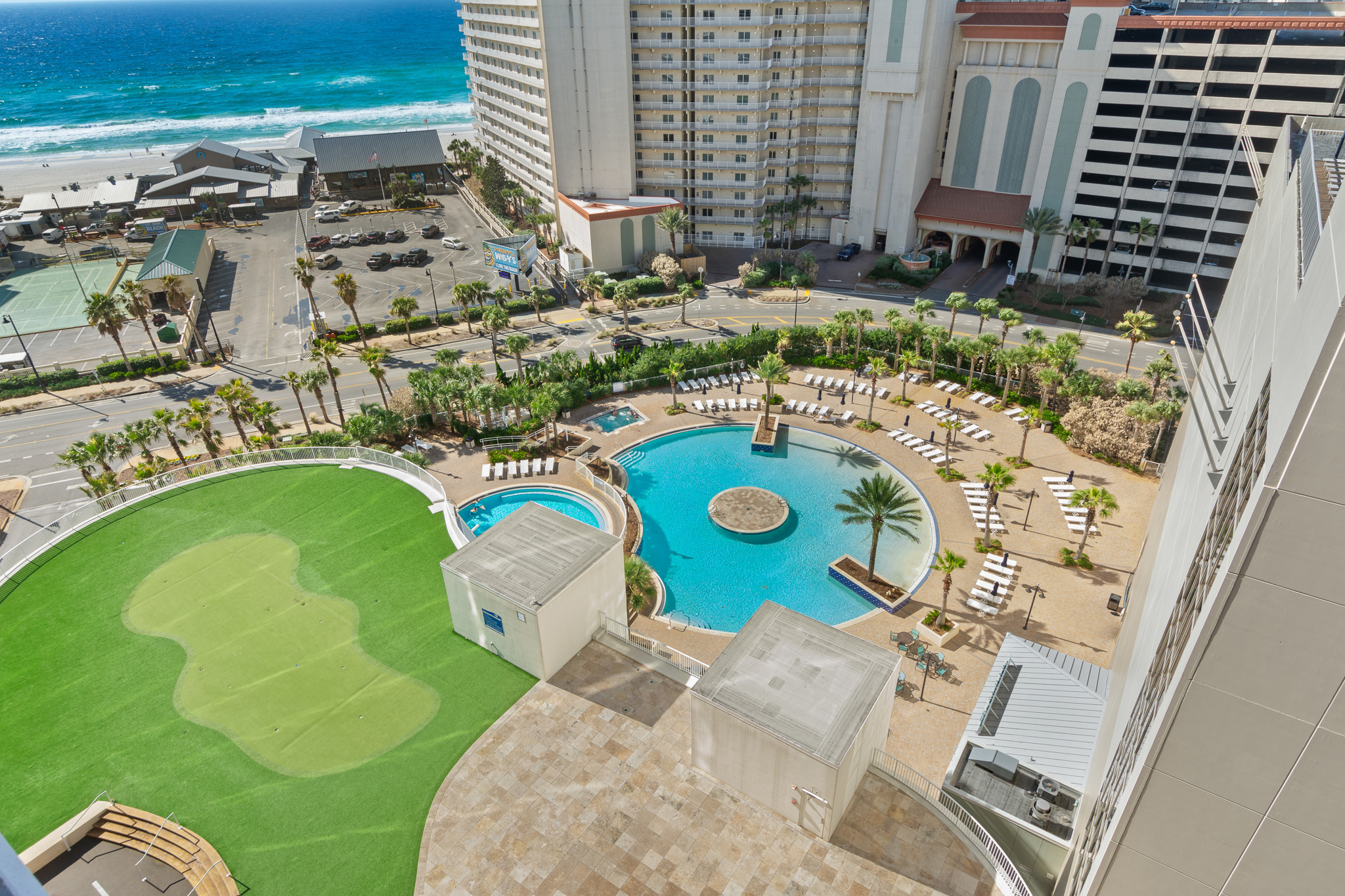 Main deck pools, hot tub, snack bar & lounge