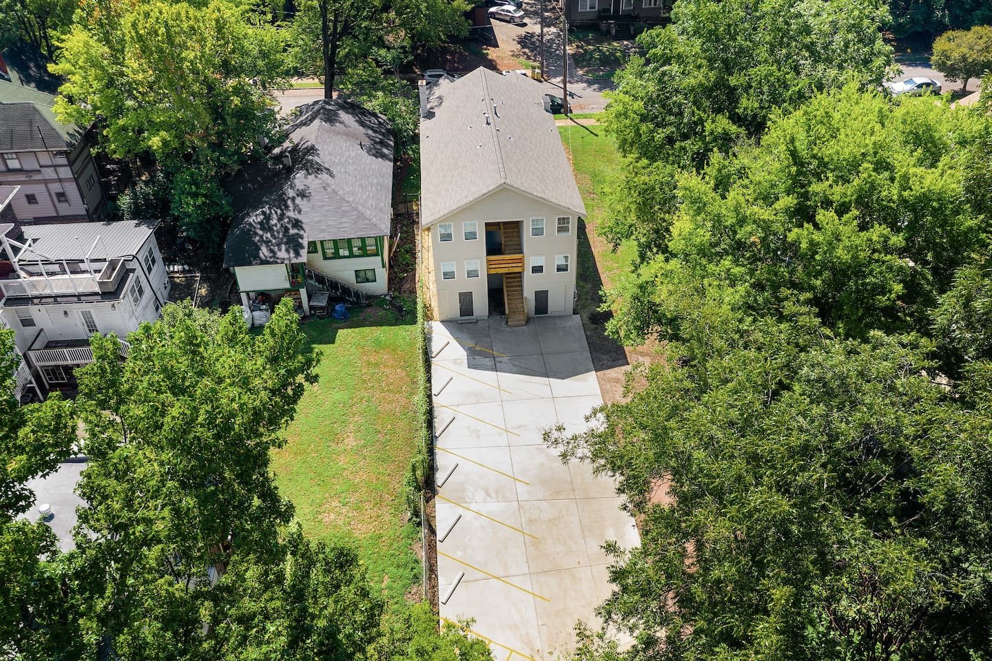 An aerial shot captures the layout of the property and its attractive location within the neighborhood.