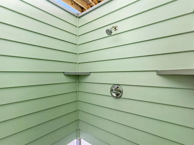 Crystal Paradise Outdoor Shower: Refresh under the sun with a private outdoor shower.