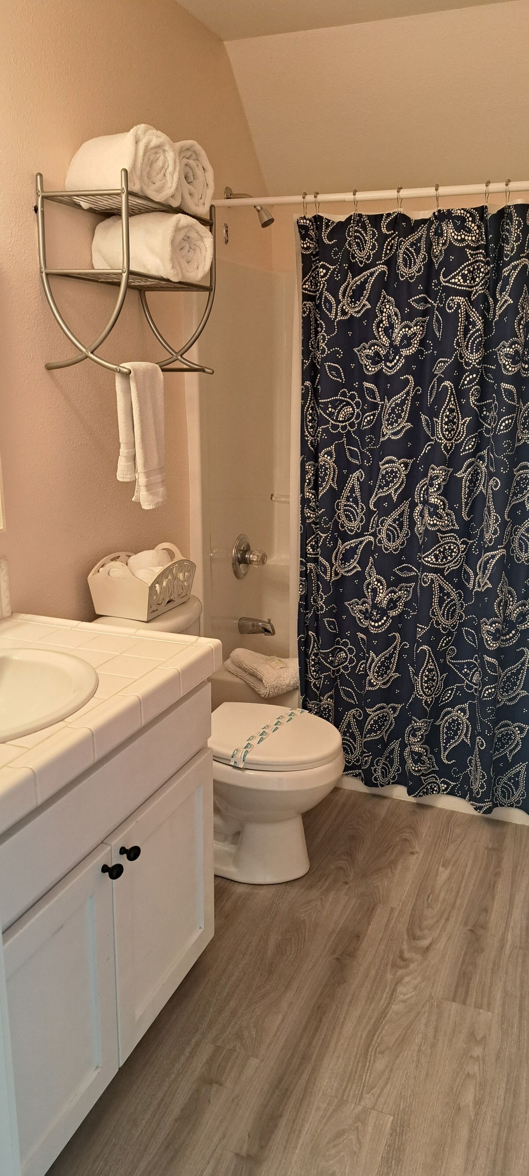 Enjoy easy access to a shared bath, designed for comfort and convenience.