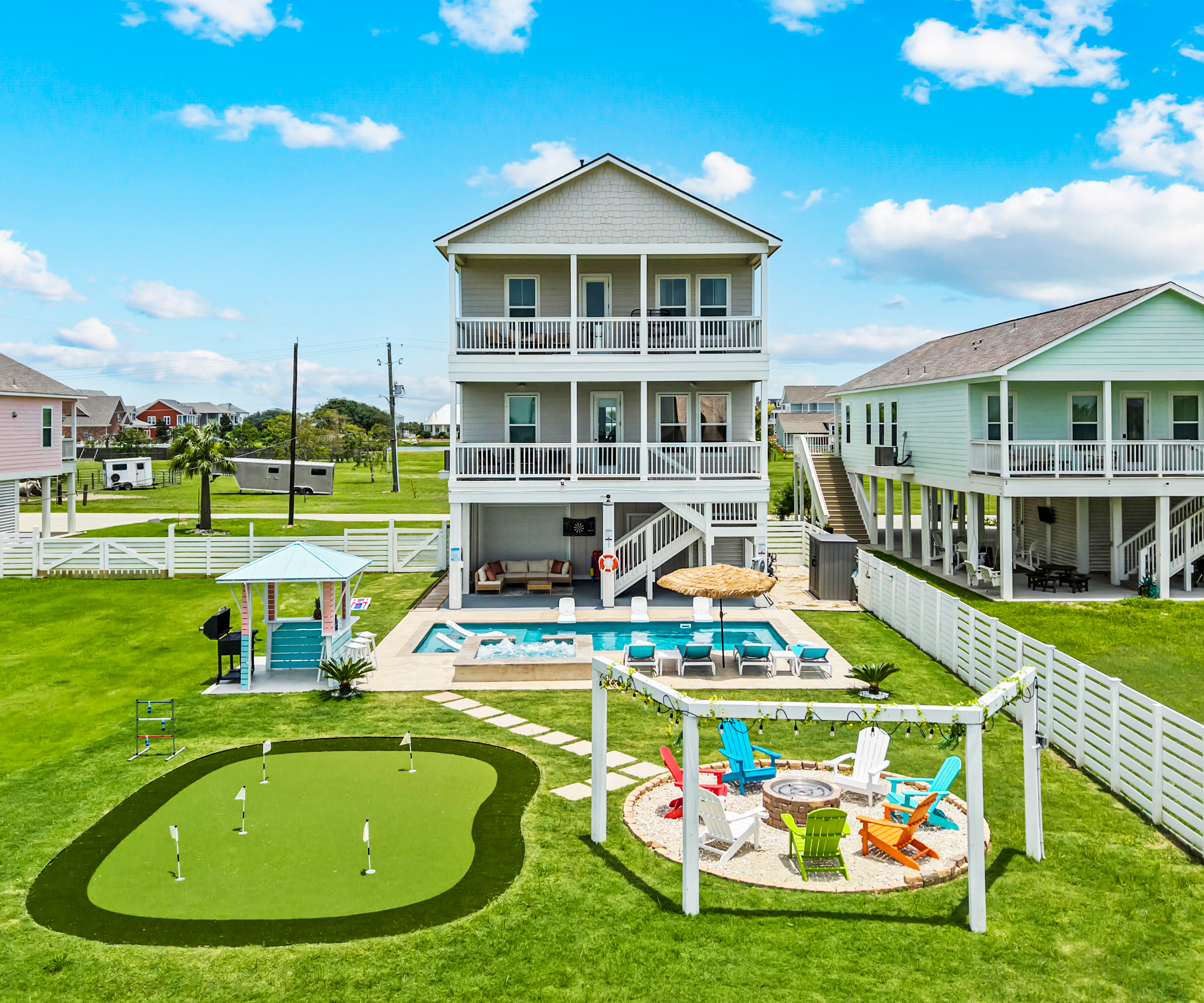 Everything You Need in One Place
From the pool and spa to the gazebo, putting green, fire pit, and outdoor entertainment areas, this drone view highlights the expansive backyard designed for relaxation and fun.
