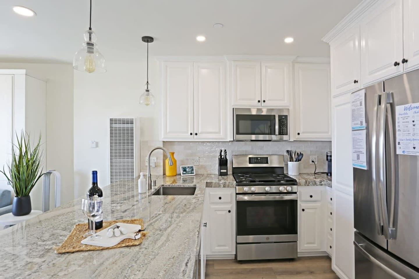 The fully-remodeled kitchen is fully-equipped enough to prepare almost any meal.  It also has granite countertops, new appliances, a fridge with filtered water and ice, and breakfast bar.