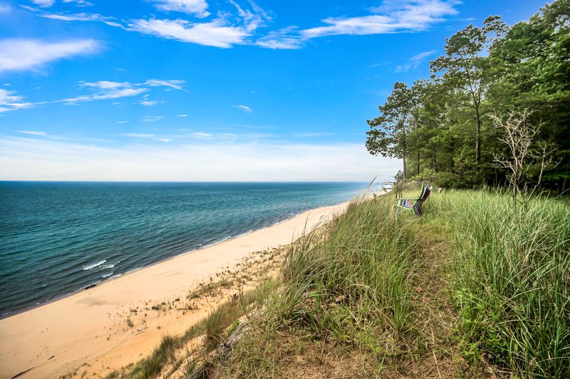 Soak in breathtaking views of Lake Michigan, where golden sands, gentle waves, and glowing sunsets make every moment feel like a vacation.