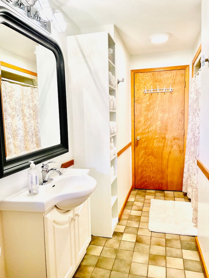 Bright bathroom with plenty of space and natural light.