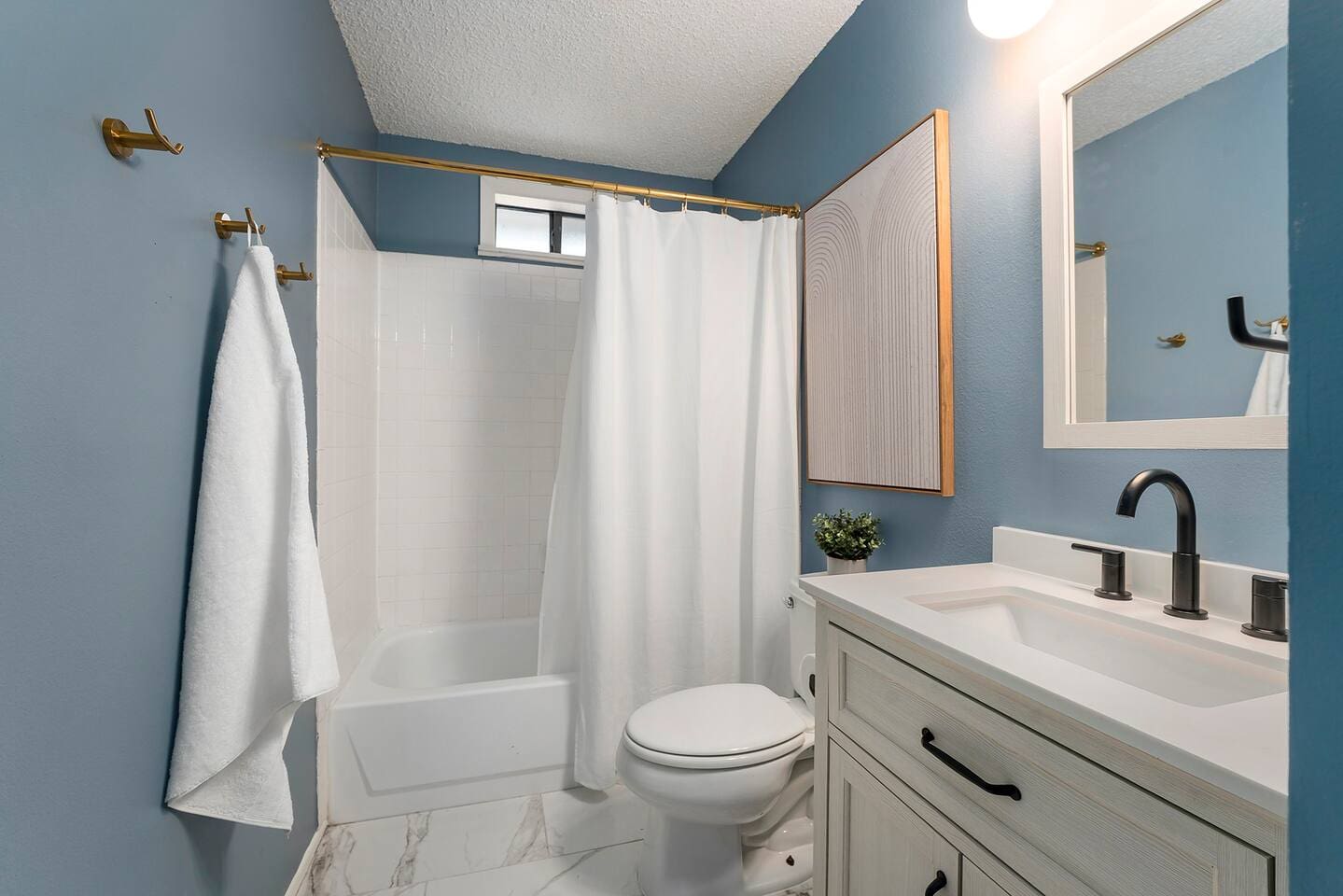 Wash your troubles away in the lovely 3-piece bathroom.