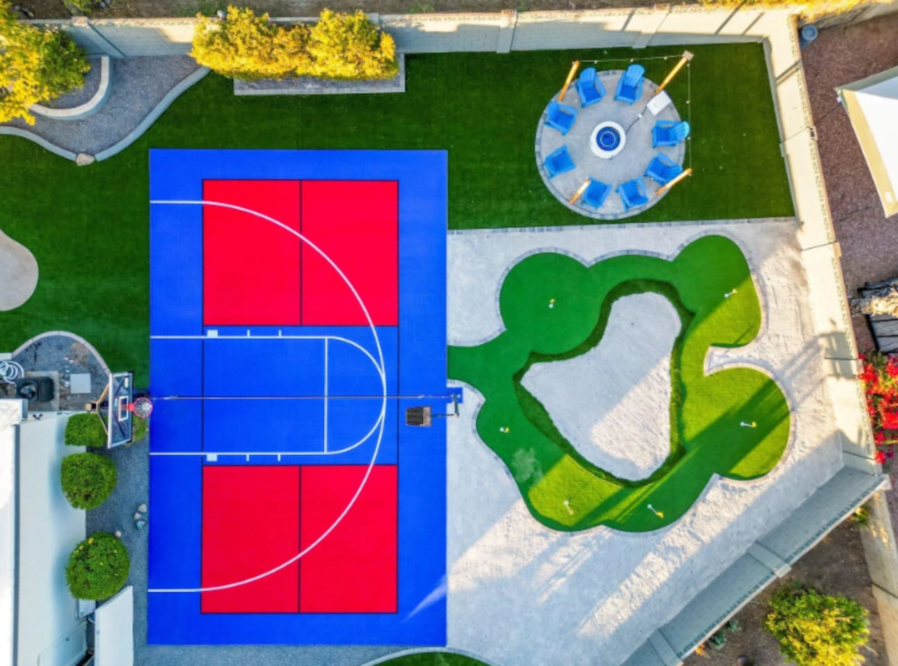 Sport court, putting green, and a shaded dining gazebo — all within a few steps of each other, all yours for the stay.