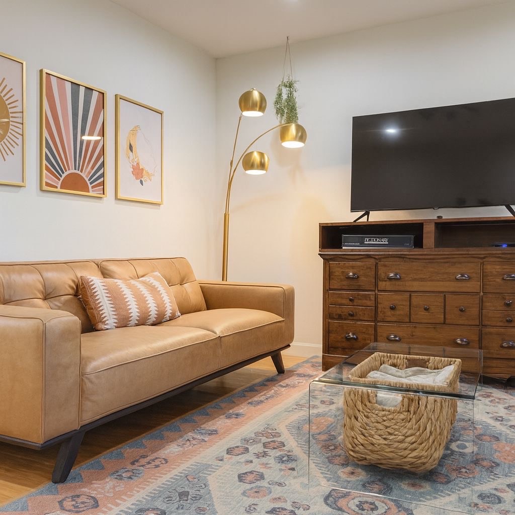 Big TV, comfy sitting areas in living room