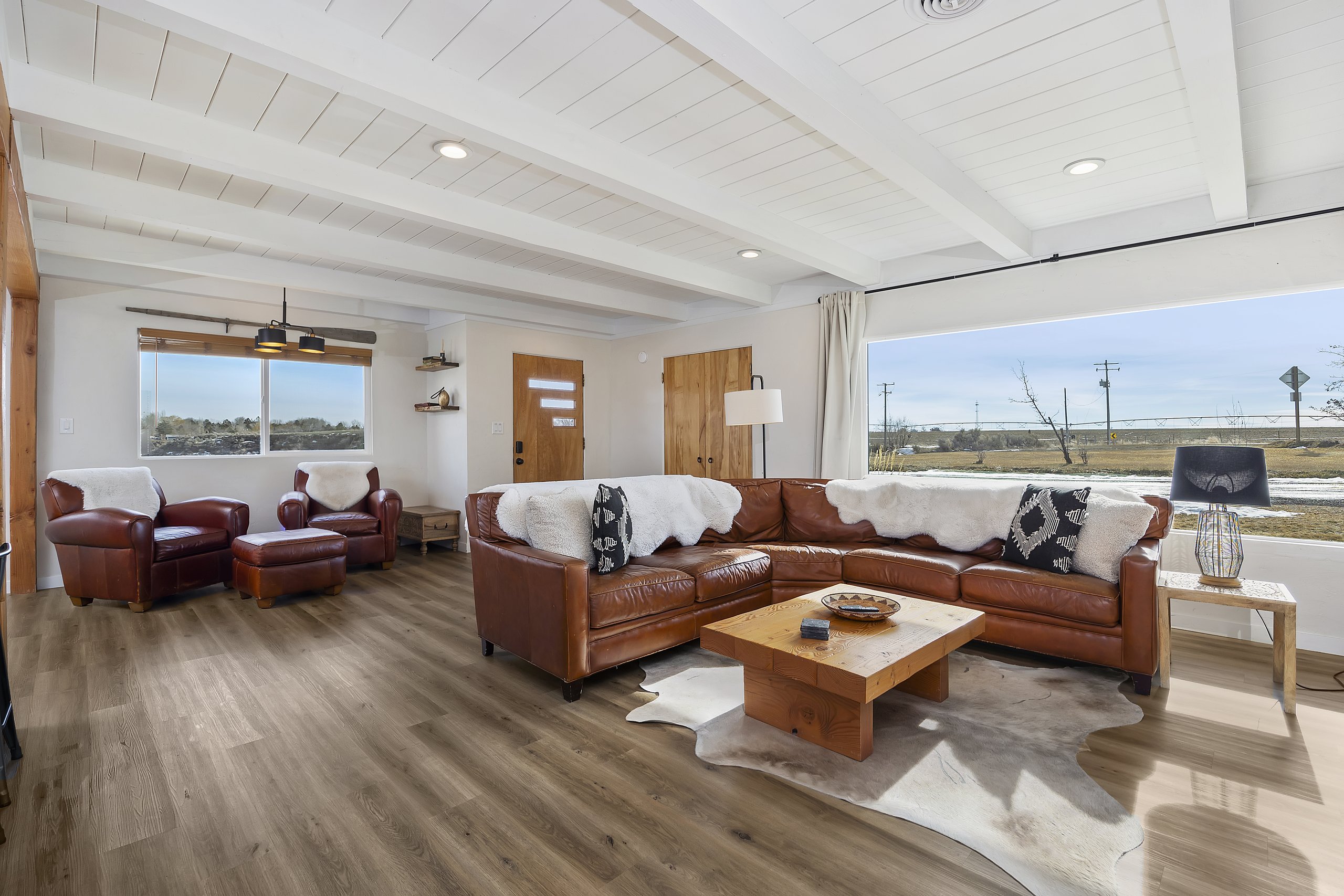 Unit 2 open-concept living and dining that flows together