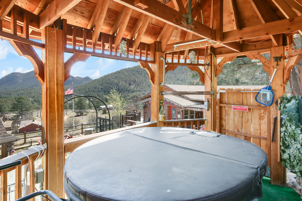 Soak under the covered gazebo with views of the surrounding forest.